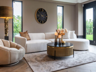 gouden salontafel op 4 zwarte poten