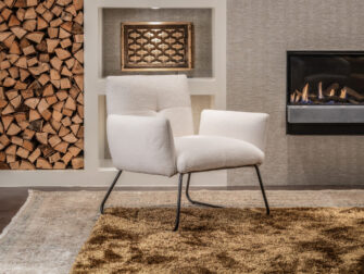 gestoffeerde fauteuil brede zitting boucle