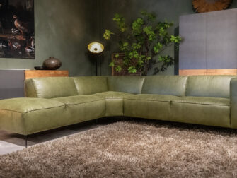 Groene hoekbank met open eiland