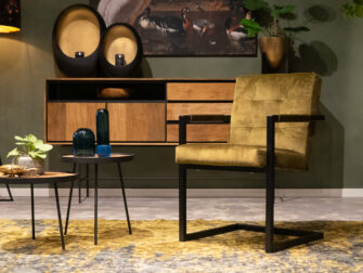 groene stoffen eetkamerstoel met stiksel