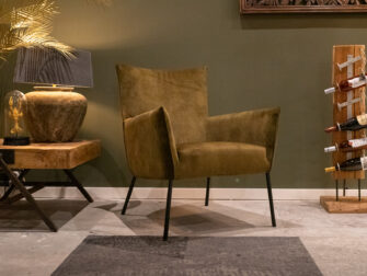 Groene stoffen fauteuil