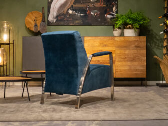 blauwe velvet fauteuil