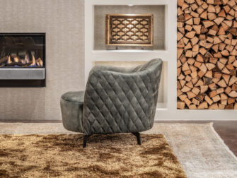 groene fauteuil zwarte poten