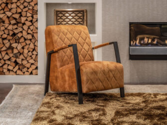 voorraad fauteuil met stoffen bekleding