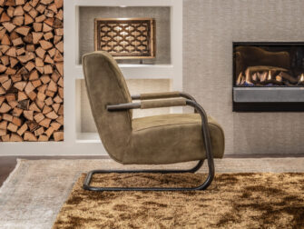 brede fauteuil groen leer