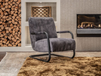 grijze brede leren fauteuil