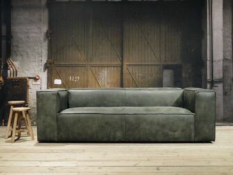 leren drie zits bank groen