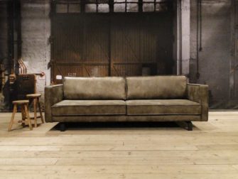 geschuurd leren bank grijs