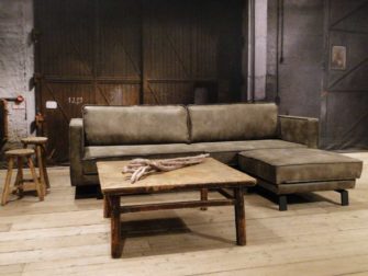 geschuurd leren bank grijs