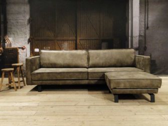 geschuurd leren bank grijs