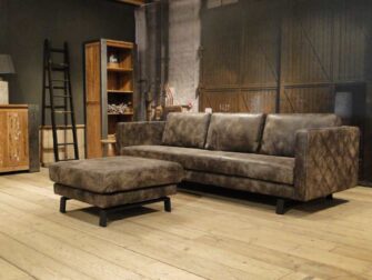 grijze geschuurd leren bank